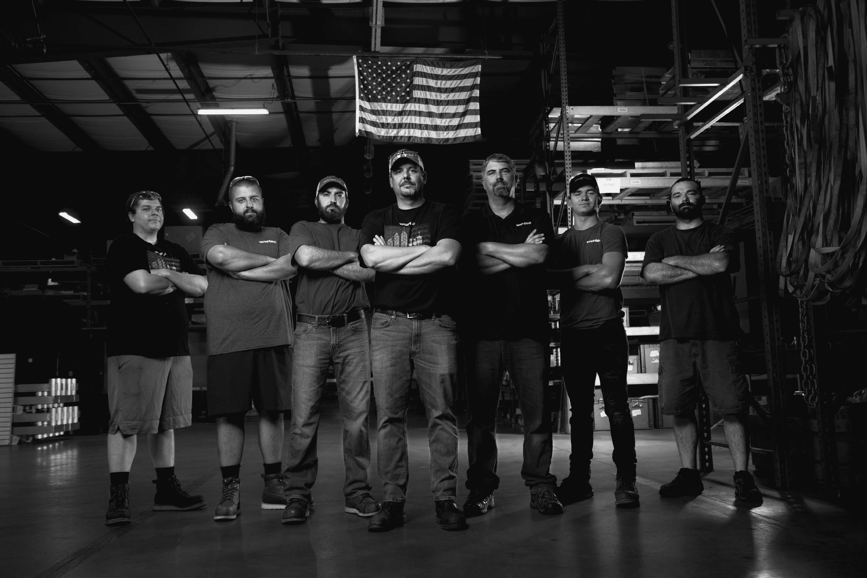 The workshop team, pictured in black and white